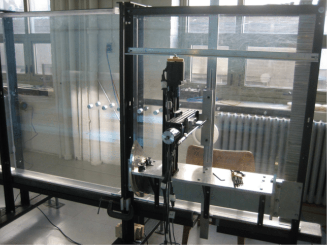 An image of how a hot-wire probe can be inserted through the walls of the flow channel to make measurements.